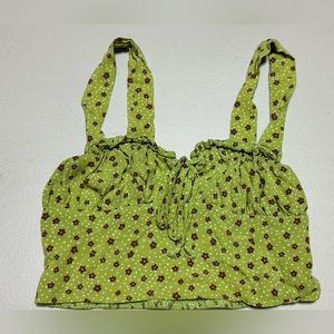 Super soft and cute going out top. Nice green with white dots and red flowers.